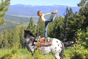 cured gymnast performing on a horse